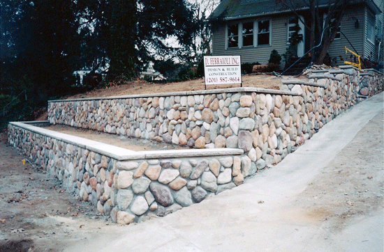 Masonry Retaining Wall / Limestone Cap and Cultured Stone